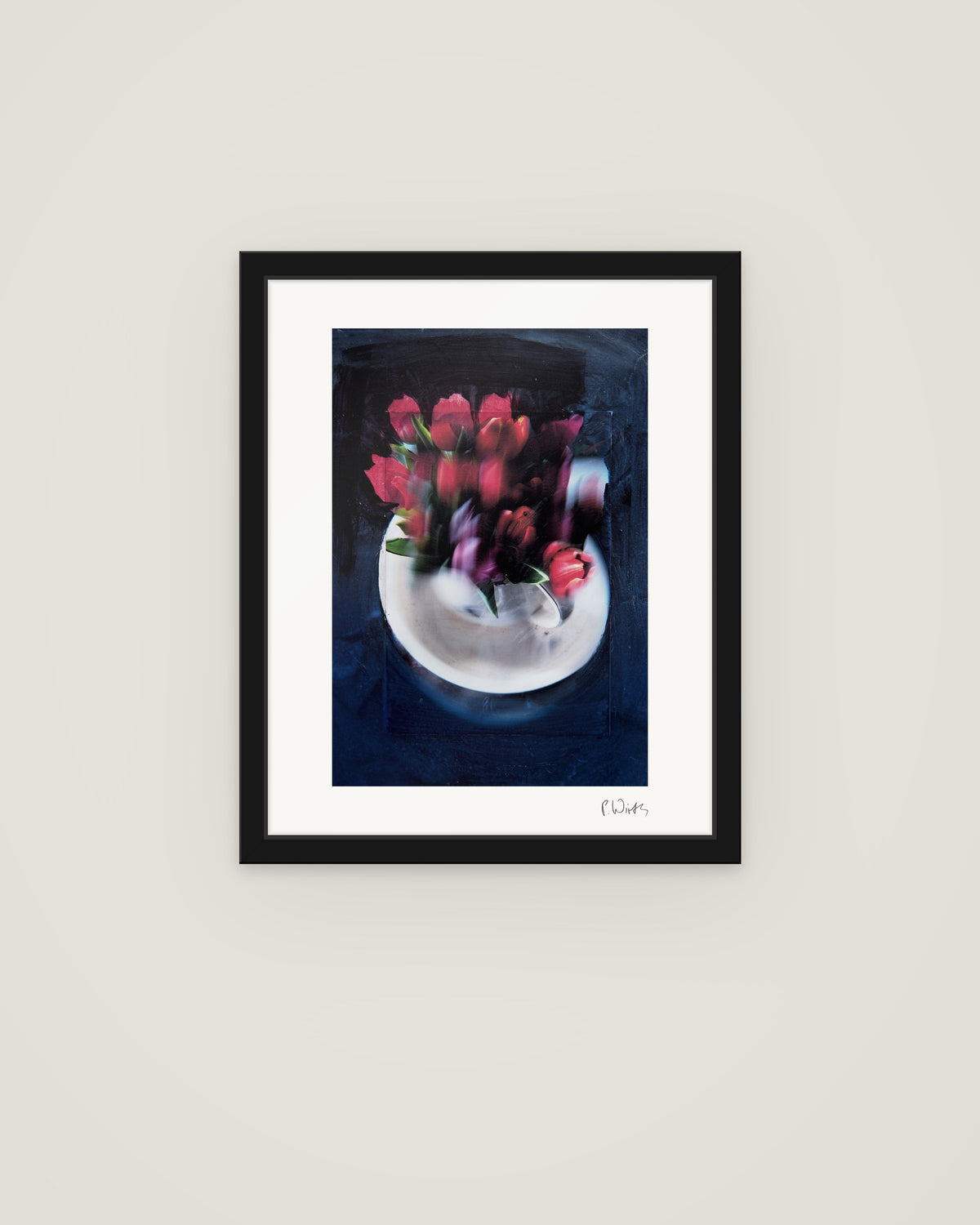 Red Tulips by Peter Wirth, framed in slim black wood with acrylic glazing