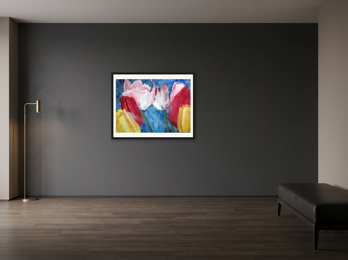 Tulip Blossoms by Peter Wirth, framed in black wood, hanging in a study