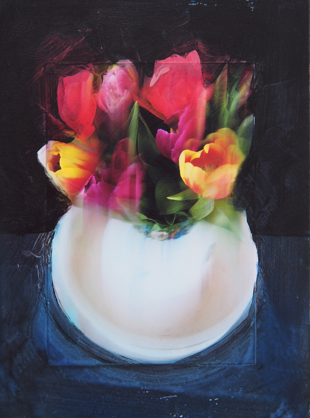A modern still life that reinterprets saturated tulips in a white vase through a fascinating motion blur and a transparent overlay — Peter Wirth
